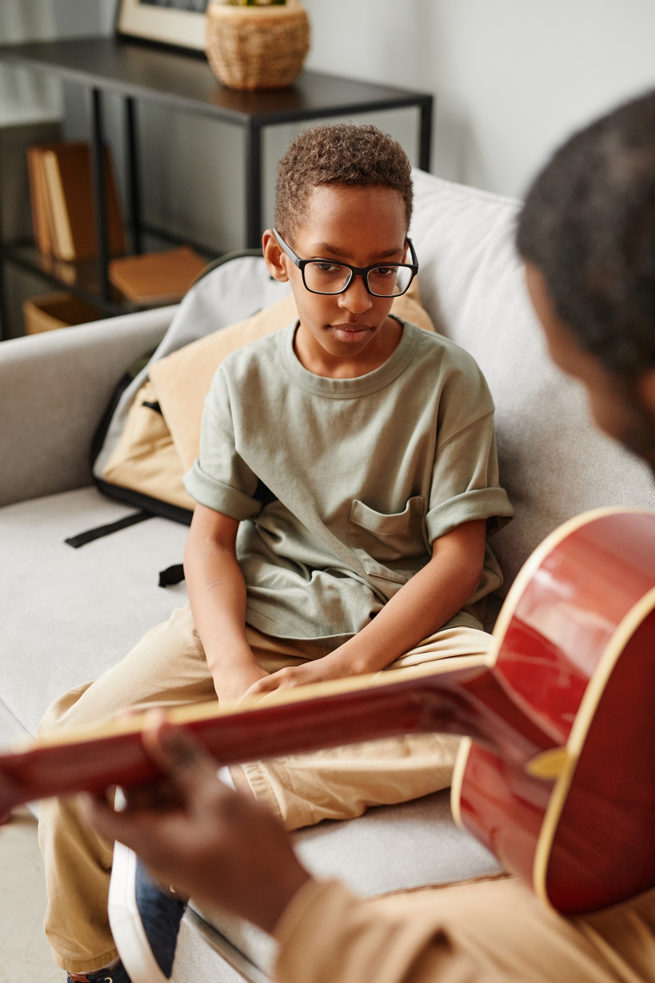 Boy with Guitar Tutor